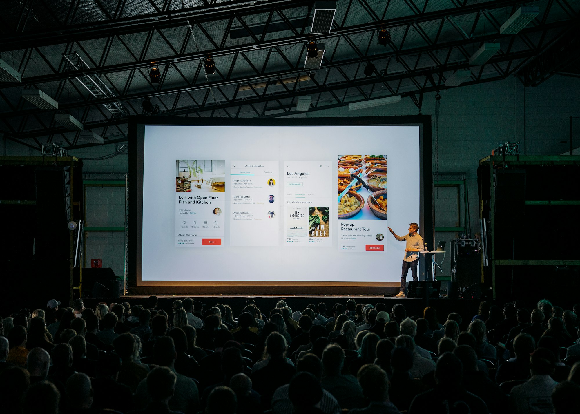 Person presenting to an audience using AI-assisted presentation tools